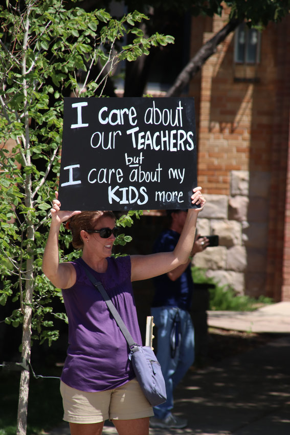 Parents protesting on July 31, 2020, to reopen schools said children’s education will suffer to greatly if schools don’t open for full, in-person learning.